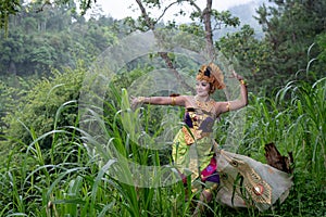 Portrait of Asia dancer at outdoor in rainforest