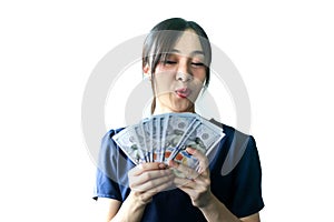 Portrait Asia smiling woman with dollars in hand,happy to have money concept