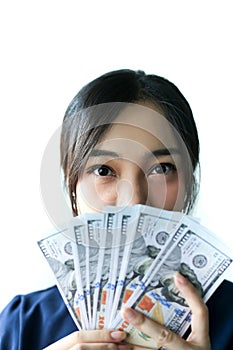 Portrait Asia smiling woman with dollars in hand,happy to have money concept
