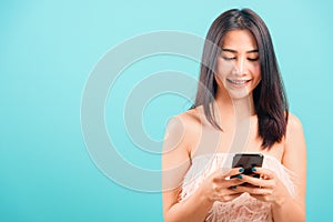 Portrait asian beautiful woman her typing message and smiling