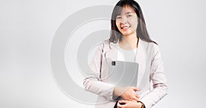 Portrait of Asian beautiful young woman smiling holding tablet computer