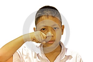 Portrait of asian boy crying with his hand cover his face in clippinh path.