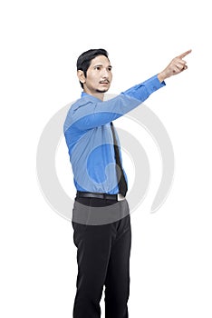 Portrait of asian businessman pointing something with his finger