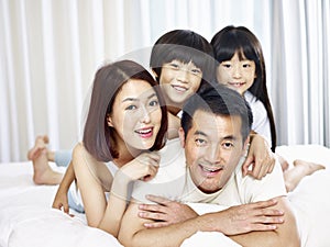 Portrait of asian family with two children