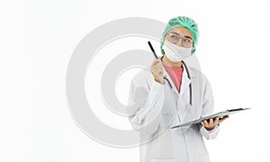 .Portrait of Asian female doctor in white gown coat wearing protective hygiene mask writing on a medical chart. Isolated on white
