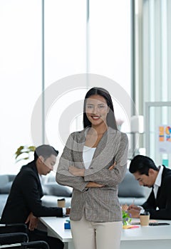 Portrait of an Asian female rookie in the new entrepreneurial team in the business