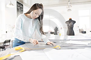 Asian Tailor in Atelier