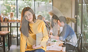 Portrait of asian female working team coworking office ,Smiling of happy beautif.ul woman in modern office