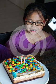 Portrait of Asian girl celebrating birthday at home