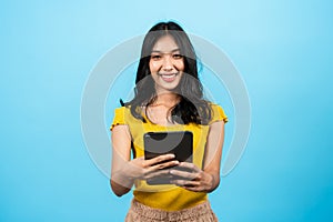 Portrait, asian girl wearing fitted shirt, stood chatted with friends on an online app in laptop was holding talking smiling