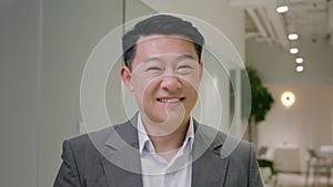 Portrait Asian happy man ethnic chinese japanese businessman male korean middle-aged smiling executive employer business