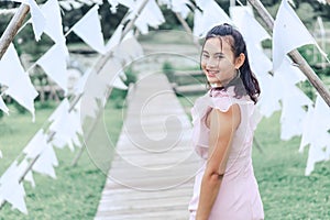 Portrait of asian happy woman smilling with nature garden , Selective focus