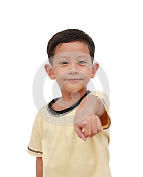 Portrait of Asian little boy pointing straight at you isolated on white background