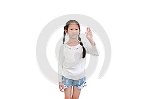 Portrait asian little child girl shows palm hand isolated on white background. Kid gestures five fingers with looking camera