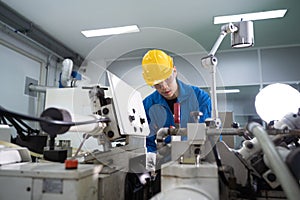 Portrait of Asian maintenance engineer workers working machines in the factory.