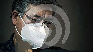 Portrait of asian man with glasses and mask. Pandemia covid virus