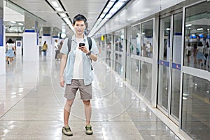 Portrait Asian man is traveler at subway for travel