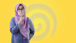 Muslim Lady Shushing Gesture photo