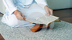 Asian Muslim Man Praying or Solat in Islam Prostration photo