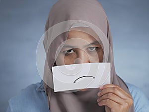 Muslim Woman With Sullen Card photo