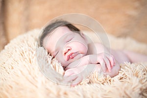 Portrait of asian parent hands holding newborn baby fingers, Closeup mother s hand holding their new born baby. Love family