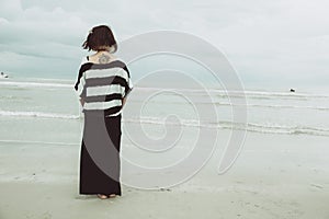 Portrait asian single tattoo hipster indy women lonely at beach