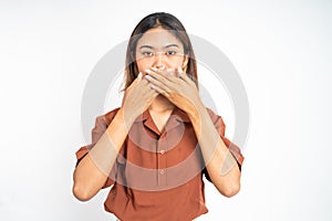 portrait of asian woman covering her mouth with hands