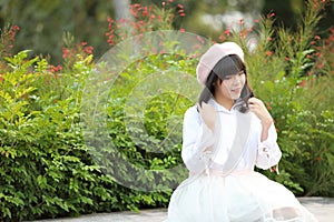 Portrait asian woman lolita dress on nature park