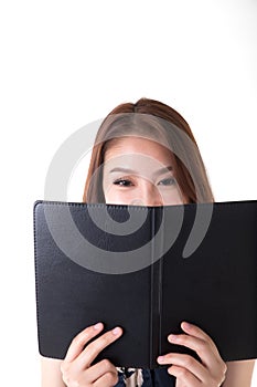 Portrait Asian woman looking at notebook