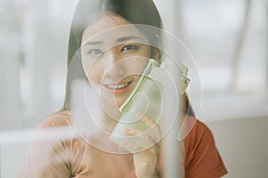 Portrait of asian woman practicing yoga at home