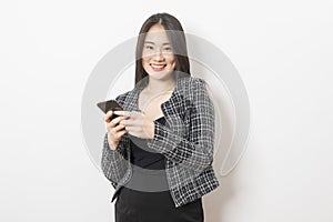 Portrait of Asian woman using mobile phone application and pointing finger to smartphone