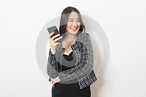 Portrait of Asian woman using mobile phone application and pointing finger to smartphone