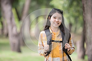 Portrait Asian young woman hiker hiking