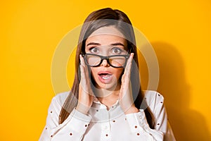 Portrait of astonished girl entrepreneur look wonderful black fridays ads novelty touch hands specs wear blouse isolated
