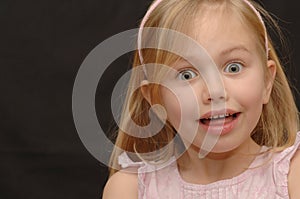 Portrait of Astonished Little Girl