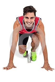 Portrait of athlete man in ready to run position