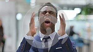 Portrait of Attractive African Businessman Screaming, Shouting