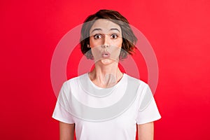 Portrait of attractive amazed girl news reaction pout lips stupor isolated over bright red color background