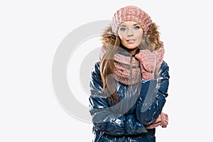 Portrait of attractive beautiful young woman wearing gloves, win