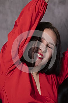 Portrait of attractive brunette woman in red blouse. st valentines