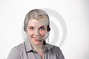 Portrait of attractive business woman with headset isolated over white background with large area for your text