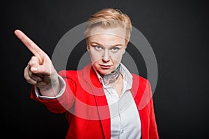 Portrait of attractive business woman showing denial gesture
