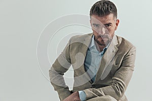 Portrait of attractive businessman in his forties wearing suit