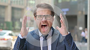 Portrait of Attractive Businessman Screaming, Shouting