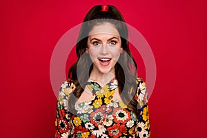 Portrait of attractive cheerful amazed cute nice girl funky hairdress having fun isolated over red color background