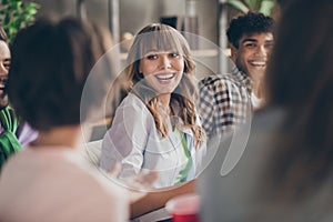 Portrait of attractive cheerful friends buddy fellow spending free time talking having fun gathering in house flat