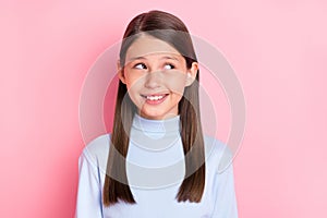 Portrait of attractive cheerful minded girl creating solution copy space isolated over pink pastel color background