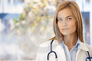 Portrait of attractive female doctor in hospital