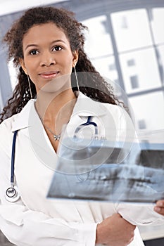 Portrait of attractive female doctor smiling