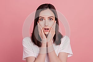 Portrait of attractive girl amazed shock omg wow fake news stupor unexpected isolated over pink color background